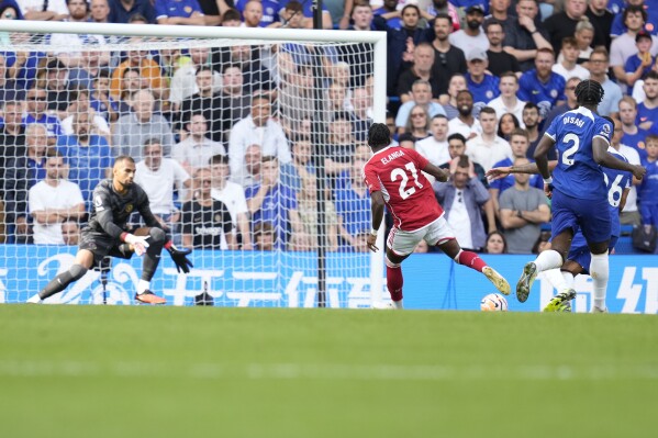 Nottingham Forest's Anthony Elanga, second from right, scores during the English Premier League soccer match between Chelsea and Nottingham Forest at Stamford Bridge stadium in London, Saturday, Sept. 2, 2023. (AP Photo/Kirsty Wigglesworth)