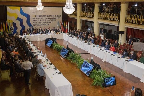 Leaders attend the plenary session of the Mercosur trade bloc summit in Montevideo, Uruguay, Tuesday, Dec. 6, 2022. (AP Photo/Matilde Campodonico)