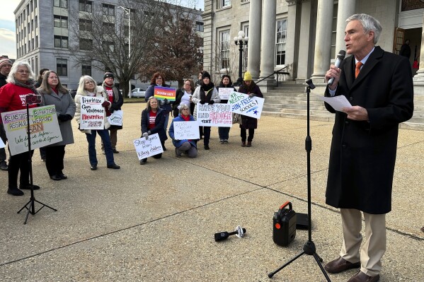 FILE - State Rep. David Meuse, D-Portsmouth, speaks to gun control supporters outside the New Hampshire Statehouse in Concord, N.H., on Wednesday, Jan. 3, 2024. The New Hampshire House on Thursday, Feb. 22, narrowly rejected creating a process by which people could voluntarily prohibit themselves from buying guns. (AP Photo/Holly Ramer, File)