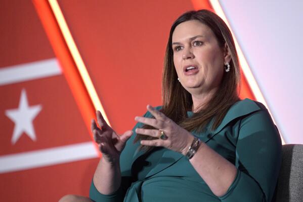 FILE - Then-Arkansas Gov.-elect Sarah Huckabee Sanders answers a question during a Republican Governors Association conference on Nov. 16, 2022, in Orlando, Fla. Gov. Huckabee Sanders has signed a new law that will allow an anti-abortion monument to be built near the state Capitol. Sanders' office said Friday, March 17, 2023 that the Republican governor signed the bill allowing the creation of a privately funded “monument to the unborn” on the Capitol grounds.(AP Photo/Phelan M. Ebenhack, File)