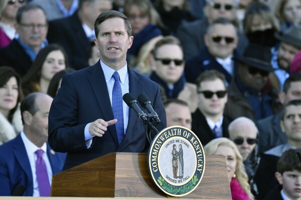 Kentucky Governor Andy Beshear speaks to the audience gathered to witness his public swearing in ceremony on the steps of the Kentucky State Capitol in Frankfort, Ky., Tuesday, Dec. 12, 2023. (AP Photo/Timothy D. Easley)