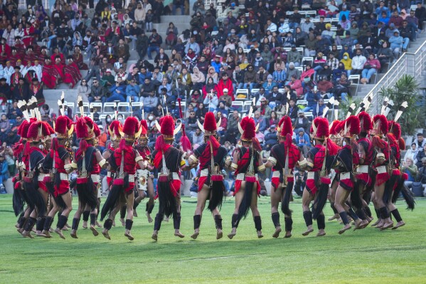 Indigenous Naga tribals dance during the Hornbill Festival in Kisama, on the outskirts of Kohima, capital of the northeastern Indian state of Nagaland, Tuesday, Dec. 10, 2024. (AP Photo/Anupam Nath)