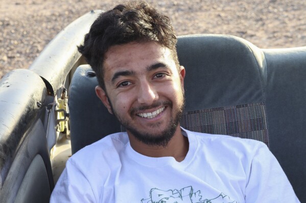 This undated photo provided by Rachel Goldberg shows her son Hersh Goldberg-Polin. The 23-year-old from Jerusalem was last seen when Hamas militants loaded him into the back of a pickup truck with other hostages abducted from a music festival in the western Negev Desert on Oct. 7. (Courtesy of Rachel Goldberg via AP)