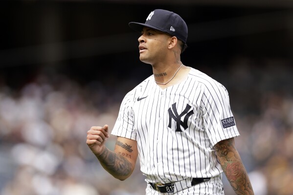 New York Yankees pitcher Luis Gil walks off the field during the fifth inning of a baseball game against the Tampa Bay Rays, Sunday, April 21, 2024, in New York. (AP Photo/Adam Hunger)