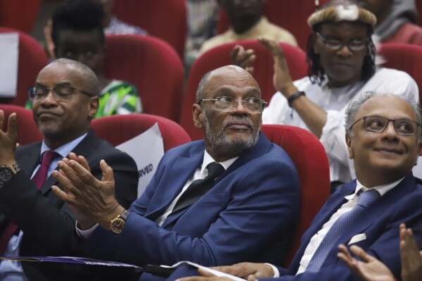Haiti's Prime Minister Ariel Henry attends a public lecture at the United States International University in Nairobi, Kenya, March 1, 2024. (AP Photo/Andrew Kasuku, File)