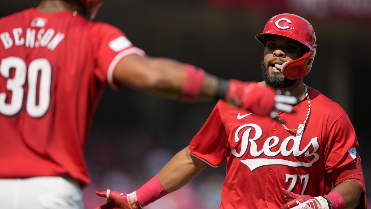 Rookie Rece Hinds hits two more long home runs, Reds beat Marlins 10-6 and win the series