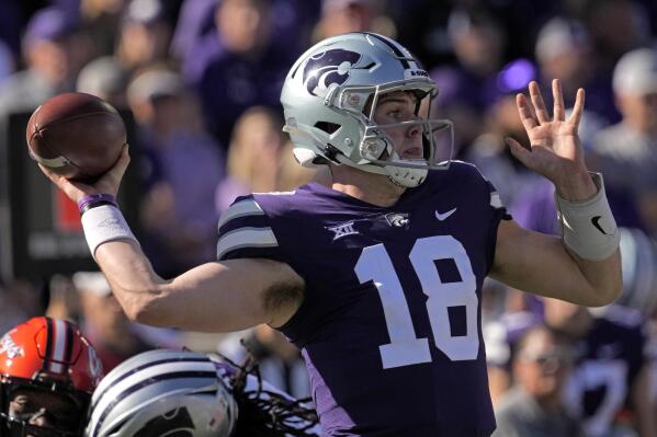 Kansas State quarterback Will Howard throws during the first half of an NCAA college football game against Oklahoma State Saturday, Oct. 29, 2022, in Manhattan, Kan. (AP Photo/Charlie Riedel)