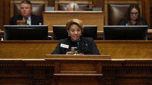 FILE - Georgia state Rep. Mesha Mainor, D-Atlanta, center, speaks in the House Chamber at the Georgia Capitol, March 6, 2023, in Atlanta. Mainor announced on Tuesday, July 11, 2023 that she was switching from the Democratic Party to the Republican Party, saying Democrats had driven her out for refusing to follow party orthodoxy. (AP Photo/Alex Slitz, File)