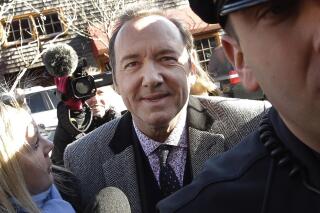 FILE - Actor Kevin Spacey arrives at district court on Monday, Jan. 7, 2019, in Nantucket, Mass., to be arraigned on a charge of indecent assault and battery. Kevin Spacey and his production companies must pay the studio behind “House of Cards” more than $30 million because of losses due to his firing from the show for sexual misconduct. That's according to an arbitration decision issued Monday, Nov. 22, 2021 (AP Photo/Steven Senne, File)