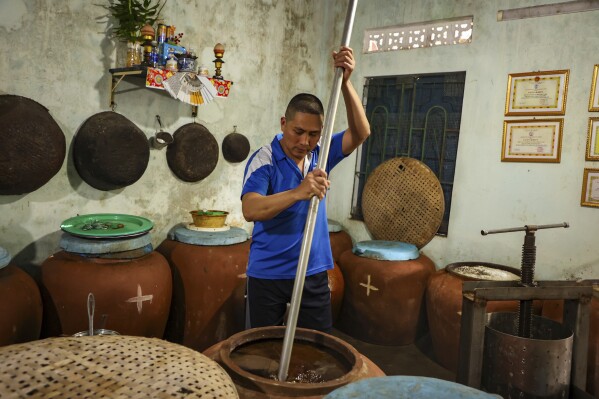 Climate change and overfishing threaten Vietnam’s ancient tradition of making fish sauce