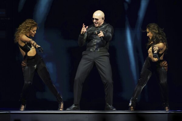Pitbull performs in concert on Monday, June 9, 2025, in London.(Photo by Scott A Garfitt/Invision/AP)