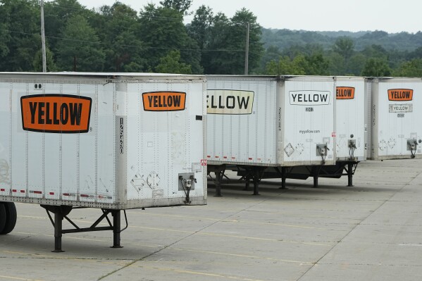 Yellow Corp. trailers are pictured at a YRC Freight facility Friday, July 28, 2023, in Richfield, Ohio. After years of financial struggles, Yellow is reportedly preparing for bankruptcy and seeing customers leave in large numbers — heightening risk for future liquidation. While no official decision has been announced by the company, the prospect of bankruptcy has renewed attention around Yellow's ongoing negotiations with unionized workers, a $700 million pandemic-era loan from the government and other bills the trucker has racked up over time. (AP Photo/Sue Ogrocki)