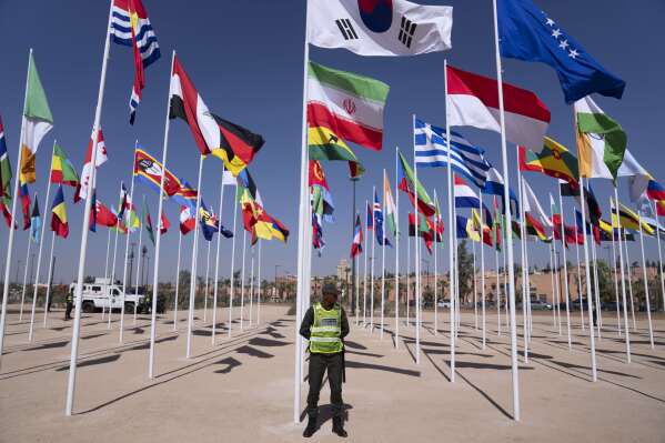 A member of the security forces stands guard outside a convention center hosting the IMF and World Bank annual meetings, in Marrakech, Morocco, Monday, Oct. 9, 2023. The International Monetary Fund and World Bank kicked off their annual meeting in Marrakech on Monday, one month after a deadly earthquake struck Morocco and killed nearly 3,000 people. (AP Photo/Mosa'ab Elshamy)