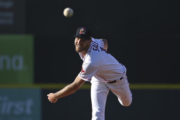 Boston Red Sox's Chris Sale pitches for the Portland Sea Dogs against the New Hampshire Fisher Cats during a baseball game Thursday, June 30, 2022, in Portland, Maine. (Shawn Patrick Ouellette/Portland Press Herald via AP)