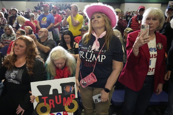 Supporters listen as Republican presidential candidate former President Donald Trump speaks at a campaign rally Saturday, March 2, 2024, in Greensboro, N.C. (AP Photo/Chris Carlson)