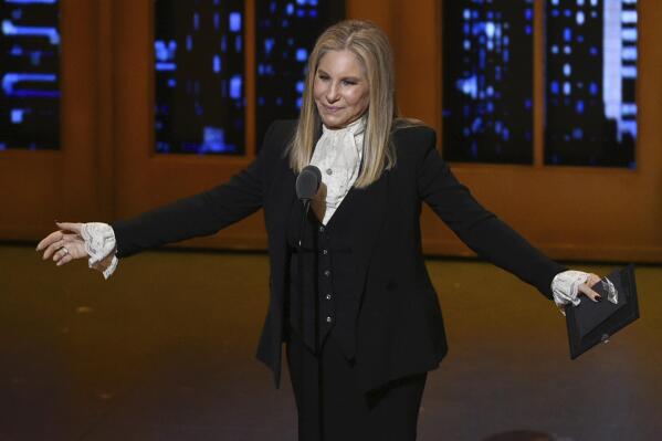 FILE - Barbra Streisand presents the award for best musical at the Tony Awards in New York on June 12, 2016. Streisand's latest release, “Barbra Streisand — Live at the Bon Soir” featuring songs from a three night stint at the Bon Soir nightclub in Greenwich Village in 1962, will be released on Nov. 4. (Photo by Evan Agostini/Invision/AP, File)
