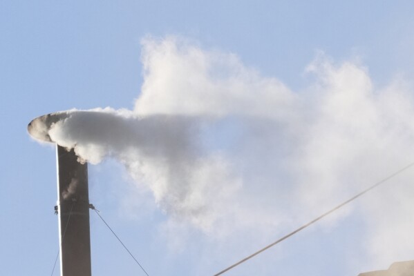 White smoke billows from the chimney of the Sistine Chapel during the conclave to elect a new pope, at the Vatican, Thursday, May 8, 2025. (AP Photo/Andrew Medichini)