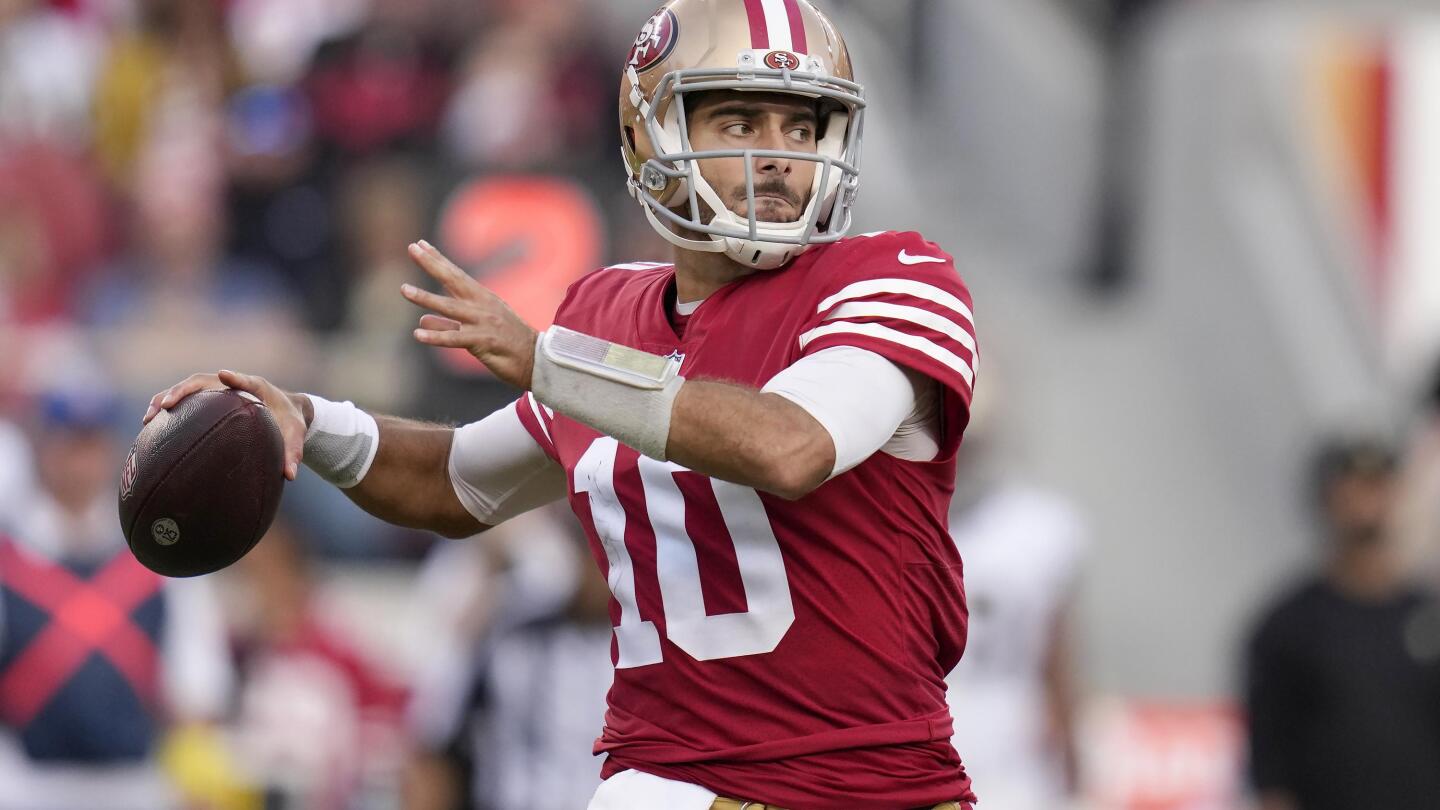 San Francisco 49ers quarterback Jimmy Garoppolo warms up before