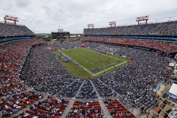 FILE - The Tennessee Titans play an NFL football game against the Houston Texans at Nissan Stadium on September 16, 2018 in Nashville, Tennessee.  (AP Photo/James Kenny, File)
