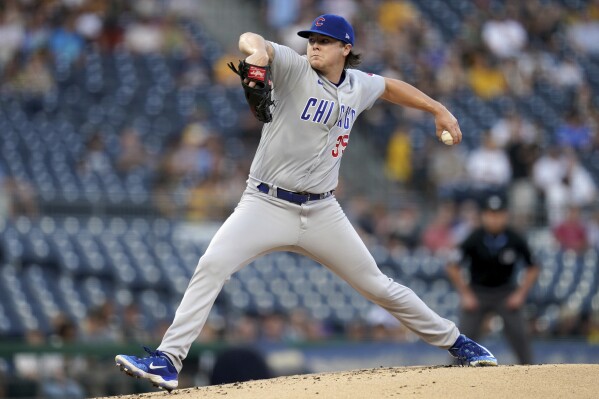 Happ's homer, 4 RBIs lead Cubs over Pirates 11-3 after rain delay - The San  Diego Union-Tribune