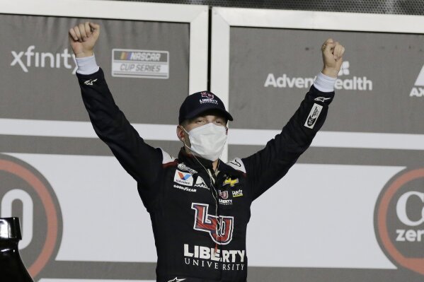 William Byron celebrates in Victory Lane after winning the NASCAR Cup Series auto race at Daytona International Speedway, Saturday, Aug. 29, 2020, in Daytona Beach, Fla. (AP Photo/Terry Renna)