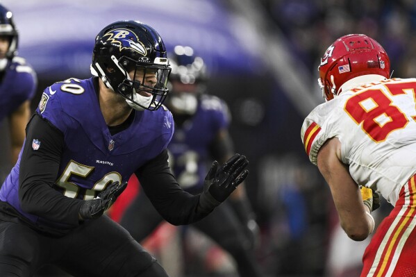 FILE - Baltimore Ravens linebacker Kyle Van Noy (50) defends during the second half of the AFC Championship NFL football game against the Kansas City Chiefs, in Baltimore, Sunday, Jan. 28, 2024. Van Noy is returning to Baltimore after agreeing on a two-year, $9 million contract, a person familiar with the terms told The Associated Press, Thursday, April 4, 2024. (AP Photo/Terrance Williams, File)