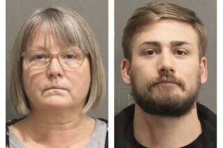 FILE - This booking photo released by the Metro Nashville, Tenn., Police Department, shows Lisa Marie Eisenhart, left, and her son Eric Gavelek Munchel. The Tennessee bartender who carried plastic zip tie handcuffs and a stun gun into the Senate gallery on Jan. 6, 2021, where he was captured in one the most widely shared photos of the U.S. Capitol riot, was sentenced Sept. 8, 2023, to nearly five years in prison. Eisenhart was also sentenced Friday to two-and-a-half years in prison.(Metro Nashville Police Department via AP)