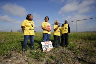 FILE - In this March 11, 2020, file photo, Sharon Lavigne, founder of environmental justice group Rise St. James, is second from the left as she and members Myrtle Felton, Gail LeBoeuf and Rita Cooper, speak against plans for a $9.4 billion chemical complex near Donaldsonville, La. Lavigne will receive what the University of Notre Dame describes as the oldest and most prestigious honor for American Catholics at the school’s commencement ceremonies May 15, 2022,  in South Bend, Indiana.. (AP Photo/Gerald Herbert, File)