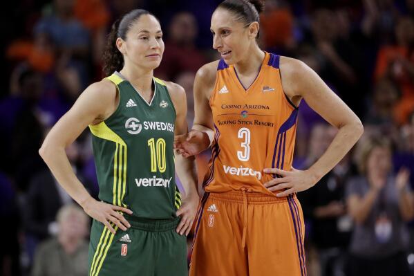 FILE - Phoenix Mercury guard Diana Taurasi (3) talks with Seattle Storm guard Sue Bird (10) during the second half of a single-game WNBA basketball playoff matchup, Wednesday, Sept. 6, 2017, in Tempe, Ariz. Seattle's Sue Bird and Mercury star Diana Taurasi share the court perhaps for the last time in a WNBA clash in Phoenix, Friday, July 22, 2022. (AP Photo/Matt York)