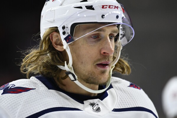 FILE - Washington Capitals' Carl Hagelin in action during an NHL hockey game against the Philadelphia Flyers, Thursday, Feb. 17, 2022, in Philadelphia. Hagelin announced in an Instagram post on Wednesday, Aug. 30, 2023, his decision to retire from the NHL at age 35, citing an eye injury that has kept him out of game action for nearly a year and a half. (AP Photo/Derik Hamilton, File)
