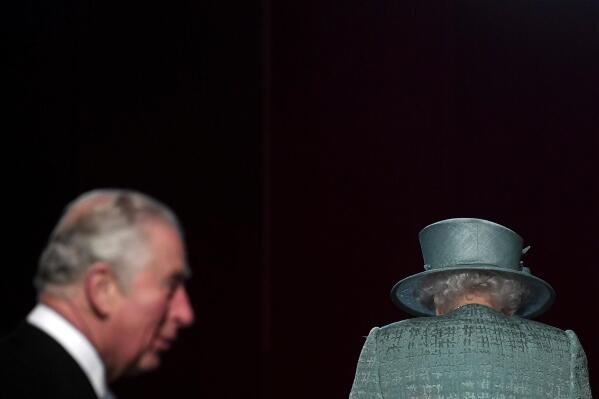 FILE - Britain's Queen Elizabeth and Prince Charles arrive for the State Opening of Parliament at the Houses of Parliament in London, Thursday Dec. 19, 2019. After spending much of his adult life in the shadow of Queen Elizabeth II, Prince Charles has taken on a greater public role in recent years, increasingly standing in for his mother in her twilight years. In May, he presided over the state opening of Parliament, the most public symbol of the monarch’s role as head of state. (Toby Melville, Pool via AP, File)
