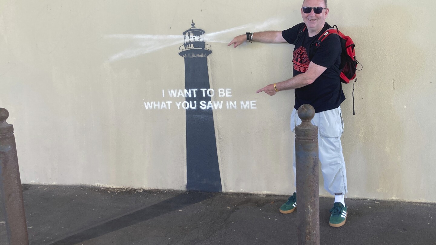 In Marseille, a shadow becomes art in Banksy’s latest street mural