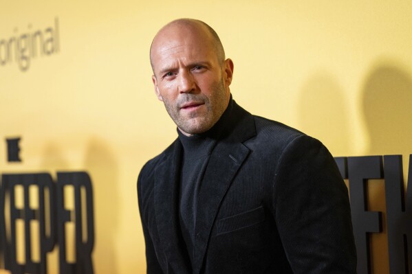 Jason Statham poses for photographers upon arrival at the UK premiere of the film 'The Beekeeper' on Wednesday, Jan. 10, 2024 in London. (Scott A Garfitt/Invision/AP)