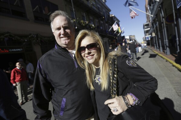 FILE - Sean and Leigh Anne Tuohy stand on a street in New Orleans, Feb. 1, 2013. Michael Oher, the former NFL tackle known for the movie “The Blind Side,” filed a petition Monday, Aug. 14, 2023, in a Tennessee probate court accusing Sean and Leigh Anne Tuohy of lying to him by having him sign papers making them his conservators rather than his adoptive parents nearly two decades ago. (AP Photo/Gerald Herbert, File)