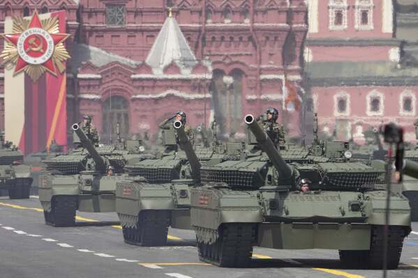 Russian T-80 BVM tanks roll in Red square during the Victory Day military parade in Moscow, Russia, Friday, May 9, 2025, during celebrations of the 80th anniversary of the Soviet Union's victory over Nazi Germany during the World War II. (AP Photo/Alexander Zemlianichenko)