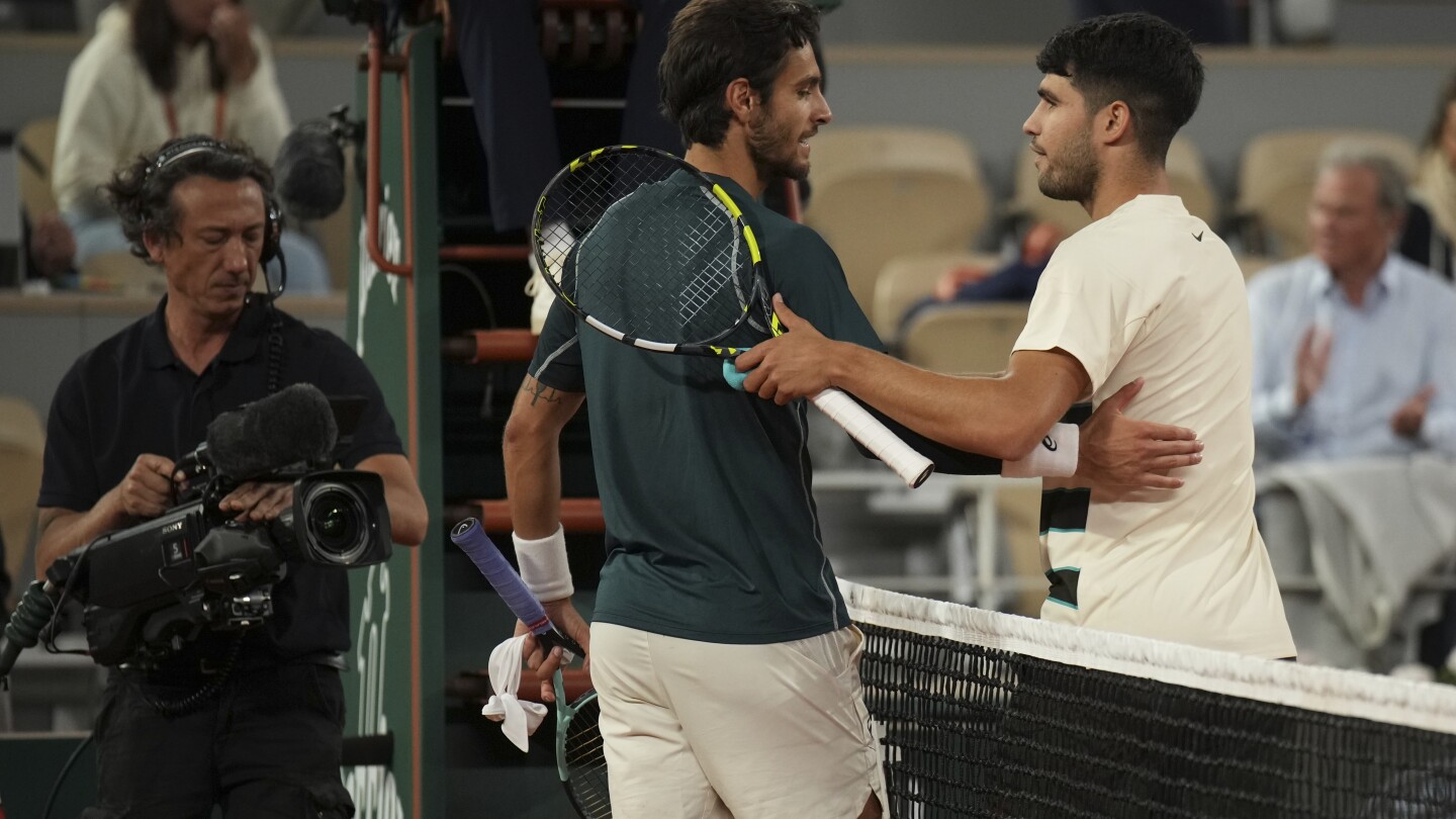 French Open: Carlos Alcaraz reaches final after Lorenzo Musetti retires with injury in fourth set