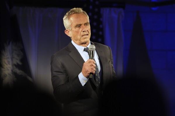 FILE - Independent presidential candidate Robert F. Kennedy Jr. speaks during a campaign event, Nov. 14, 2023, in Columbia, S.C. Robert Kennedy Jr.’s presidential ambitions resulted in public family drama after a political action committee aired a Super Bowl ad invoking the Democratic family’s legacy to implicitly compare the independent candidate to his assassinated uncle, President John F. Kennedy. (AP Photo/Meg Kinnard, FIle)