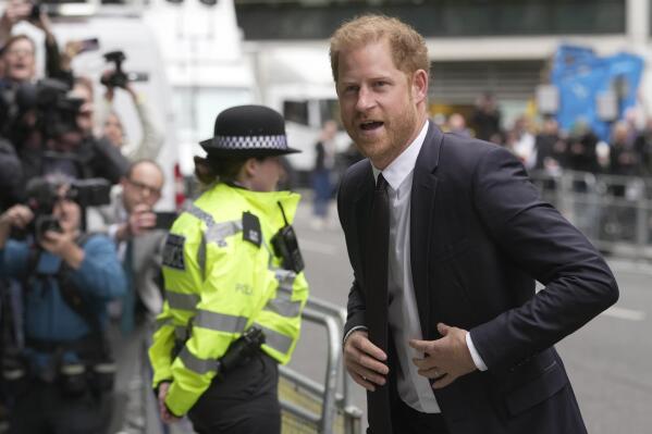 Prince Harry arrives at the High Court in London, Tuesday, June 6, 2023. Prince Harry is due at a London court to testify against a tabloid publisher he accuses of phone hacking and other unlawful snooping. Harry alleges that journalists at the Daily Mirror and its sister papers used unlawful techniques on an "industrial scale" to get scoops. Publisher Mirror Group Newspapers is contesting the claims. (AP Photo/Kin Cheung)