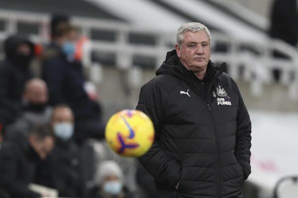 FILE - In this Wednesday, Dec, 30, 2020 file photo, Newcastle's head coach Steve Bruce watches his team from the side lines during the English Premier League soccer match between Newcastle United and Liverpool at St James' Park stadium in Newcastle, England. Newcastle has parted ways with manager Steve Bruce as its Saudi ownership began reshaping the team two weeks after buying the Premier League club it was reported on Wednesday, Oct. 20, 2021. The decision is the first big call by the Saudi sovereign wealth fund that took control of the northeast English club, which is in the relegation zone eight matches into the season. Newcastle said Bruce left by “mutual consent” after being in charge since July 2019. (AP Photo/Scott Heppell, File)