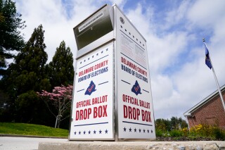 FILE - A Delaware County secured drop box for the return of vote-by-mail ballots is pictured, May 2, 2022, in Newtown Square, Pa. An exterior envelope date requirement in Pennsylvania's mail-in voting system does not run afoul of a civil rights law, a federal appeals court panel said Wednesday, March 27, 2024, in overturning a lower-court ruling. (AP Photo/Matt Rourke, File)