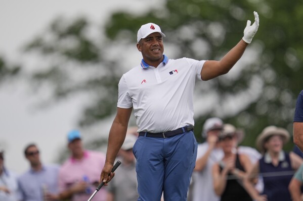 Jhonattan Vegas, of Venezuela, watches his tee shot on the 17th hole during the second round of the PGA Championship golf tournament at the Quail Hollow Club, Friday, May 16, 2025, in Charlotte, N.C. (AP Photo/George Walker IV)
