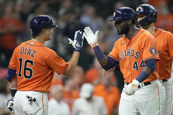 Houston Astros' Yordan Alvarez (44) celebrates with Aledmys Diaz (16) after hitting a two-run home run against the Seattle Mariners during the third inning of a baseball game Friday, Aug. 20, 2021, in Houston. (AP Photo/David J. Phillip)