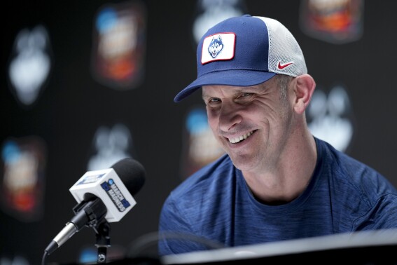 FILE - UConn head coach Dan Hurley speaks to the media during a news conference ahead of a Final Four college basketball game in the NCAA Tournament, Thursday, April 4, 2024, in Glendale, Ariz. UConn plays Alabama on Saturday. Hurley’s Huskies have added multiple transfers after winning a second straight NCAA title. (AP Photo/David J. Phillip, File)