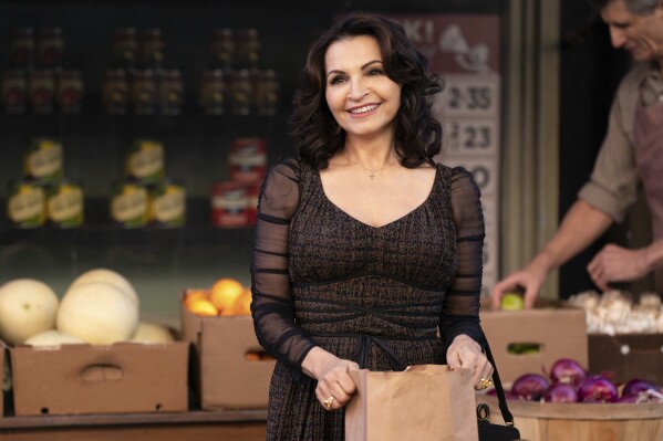 This image released by Warner Bros. Pictures shows Kathrine Narducci as Anna Genovese, in a scene from "The Alto Knights." (Jennifer Rose Clasen/Warner Bros. Pictures via AP)