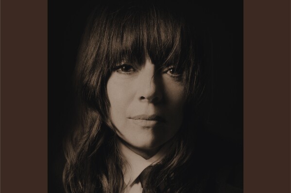 This image released by Domino Recording Company shows "Cat Power Sings Dylan: The 1966 Royal Albert Hall Concert." (Domino Recording Company via AP)