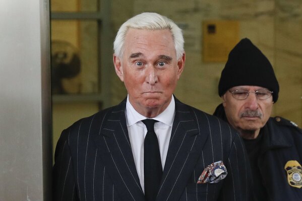 FILE - In this Feb. 1, 2019 file photo, former campaign adviser for President Donald Trump, Roger Stone, leaves federal court in Washington. The Justice Department said Tuesday it will take the extraordinary step of lowering the amount of prison time it will seek for Roger Stone, an announcement that came just hours after President Donald Trump complained that the recommended sentence for his longtime ally and confidant was “very horrible and unfair." (AP Photo/Pablo Martinez Monsivais)
