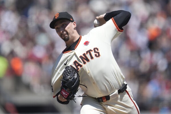 San Francisco Giants pitcher Blake Snell works against the Philadelphia Phillies during the first inning of a baseball game in San Francisco, Monday, May 27, 2024. (AP Photo/Jeff Chiu)