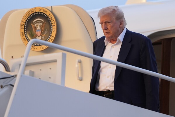 President Donald Trump arrives on Air Force One at Joint Base Andrews, Md., Sunday, May 4, 2025. (AP Photo/Manuel Balce Ceneta)