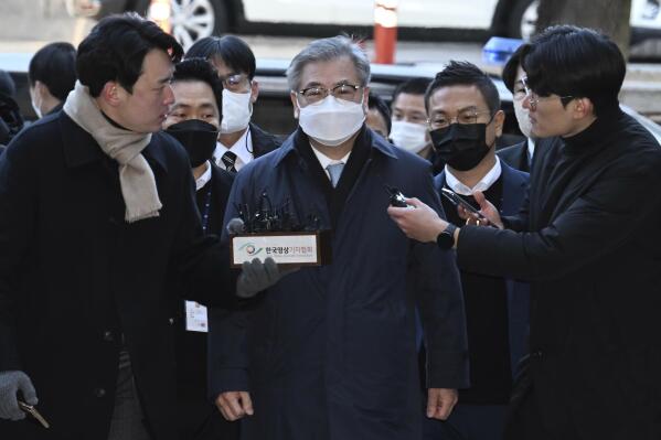 Former South Korean National Security Director Suh Hoon, center, arrives at the Seoul Central District Court in Seoul, South Korea, Friday, Dec. 2, 2022. South Korean prosecutors arrested the country’s former national security director on Saturday over suspicions that he engaged in a cover-up to hide details and distort the circumstances surrounding North Korea’s killing of a South Korean fisheries official near the rivals’ sea boundary in 2020. (Han Sang-kyun/Yonhap via AP)