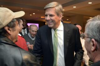 FILE — Republican gubernatorial candidate Bob Stefanowski greets supporters at an election night party, Nov. 6, 2018, in Rocky Hill, Conn. Stefanowski is seeking a rematch against a former political rival, Democratic Gov. Ned Lamont. (AP Photo/Stephen Dunn, File)